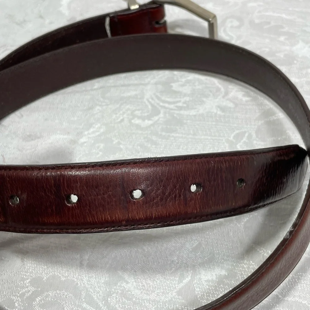 Dockers Men's Classic Brown Leather Belt Size 42 with Silver Tone Buckle.